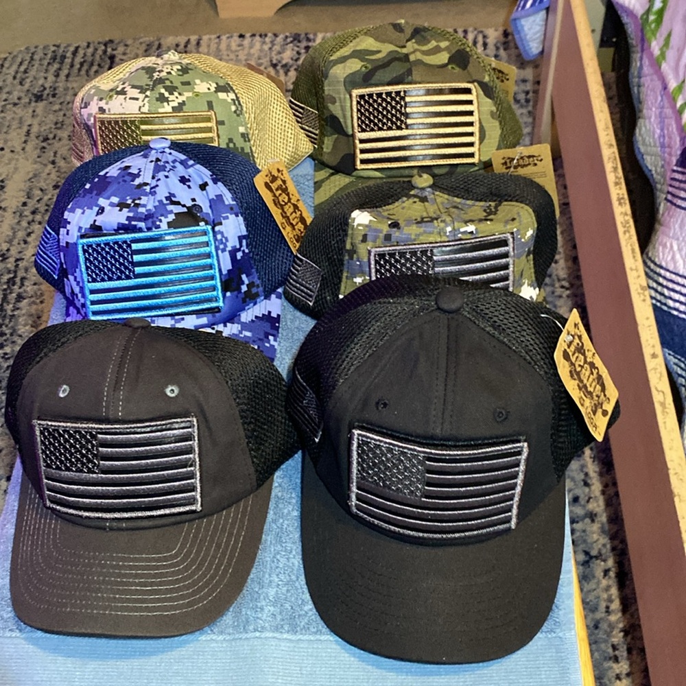 Lot of 6 Unisex trucker hats. Brand new, with hook and loop US flag.